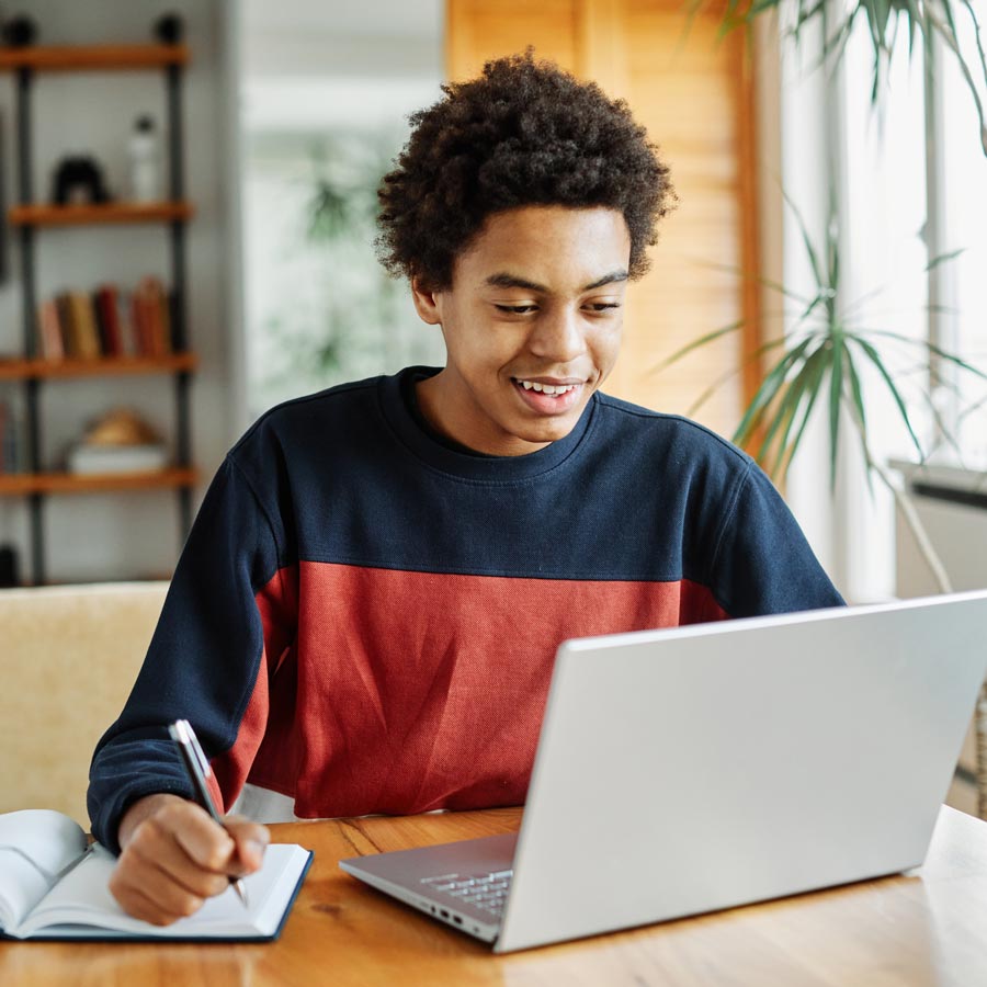HowtoApply-OTAPrograms_Feature Occupational therapist pushes client in wheelchair on playground